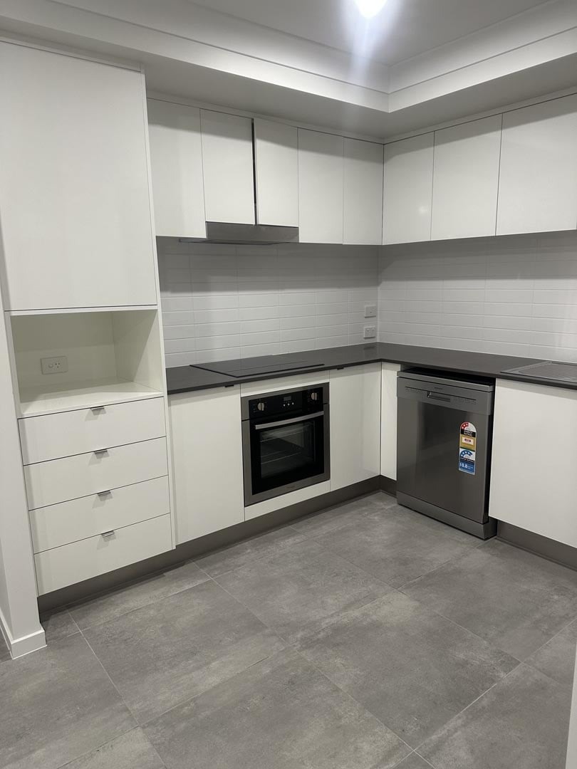 Streak-free kitchen cabinetry and tiled floor after a Stormforce Cleaning CQ clean in Rockhampton